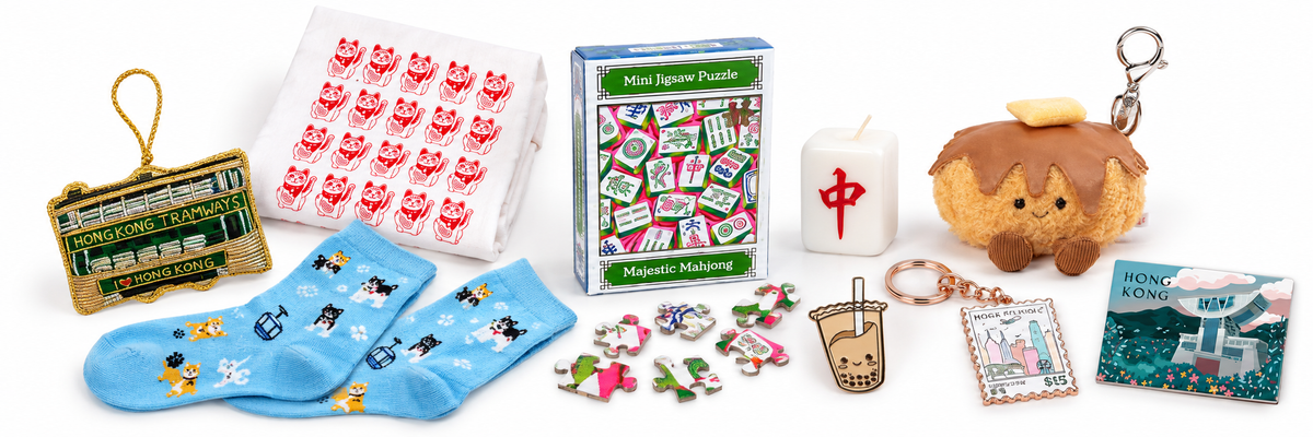 Stocking fillers collage with tram ornament, lucky cat tea towel, mahjong puzzle and candle, toast charm, dog socks, bubble tea pin, skyline keychain and Peak magnet