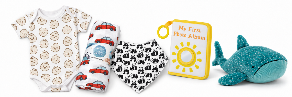 Baby Gifts collage with dumpling onesie, taxi swaddle, panda bib, Sunny Sun My First Photo Album and Jellycat whale shark