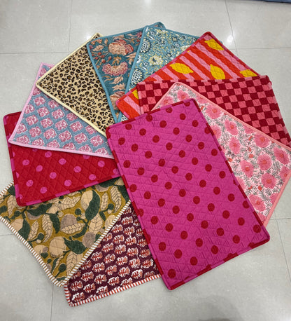 Table Talk quilted cotton placemats in eleven floral, botanical, leopard, check, lemon and polka dot designs