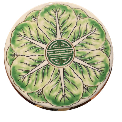 Longevity Garden ceramic coaster, white background